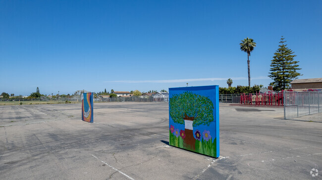 Creative murals decorate hand ball courts at Ericson Elementary School in Mira Mesa.