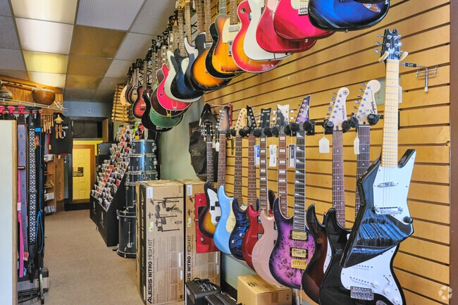 Take a short walk to South Park's 'Larrytown' and browse guitars at Oz’s Music.