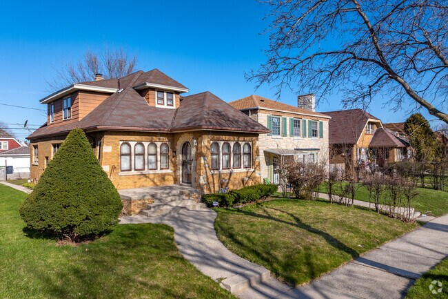 A wonderful brick bungalow and stone stone colonial in the Rufus King neighborhood.