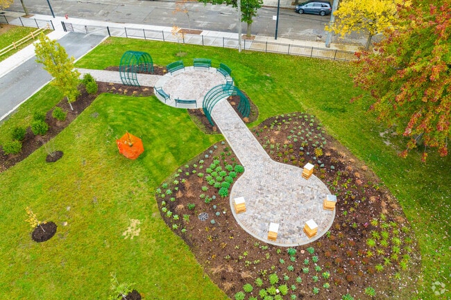 Smyth J Elementary School features a nice green space with a seating area.
