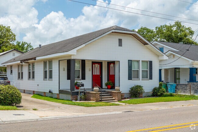 Apple Street in Norco is lined with small farmhouse cottages and mature trees.