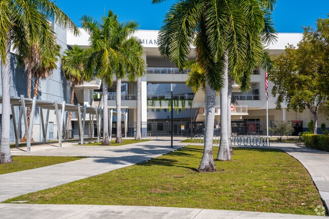 The entrance to Miami Beach Senior High School can be found on Dade Blvd..