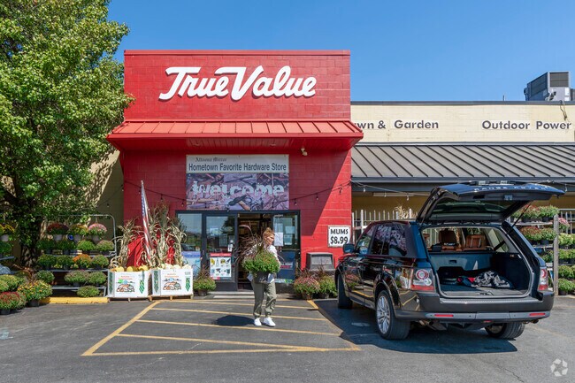 Highland Park's western border is 6th Avenue is lined with businesseslike True Value Hardware.