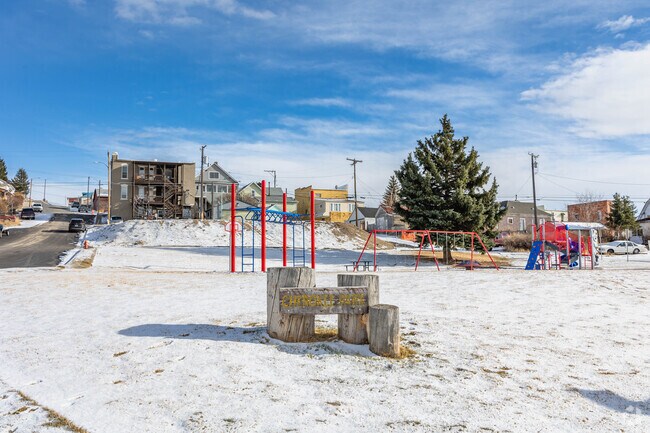 Cherokee Park in Uptown Butte has some play sets that kids can play on year-round.