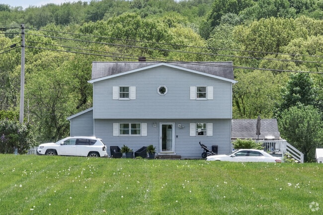 A split level home with plenty of outdoor space in Curtisville.