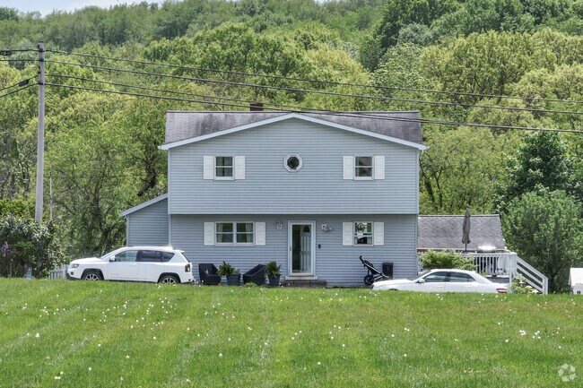 A split level home with plenty of outdoor space in Curtisville.