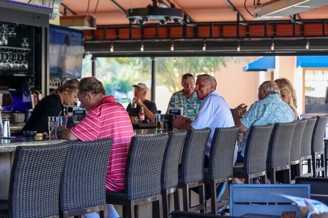 Harmeswood of Belle Aire retirees can go to an early happy hour at 
Amerikanos Grille.