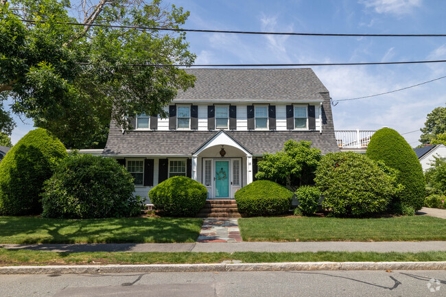 This teal door steals the show on this side street by Merrymount Elementary in Adams Shore.