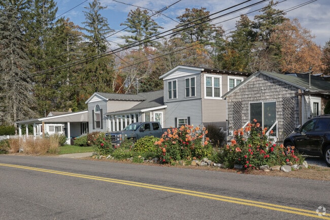Tall trees and lush greenery envelop many homes in Brimfield.