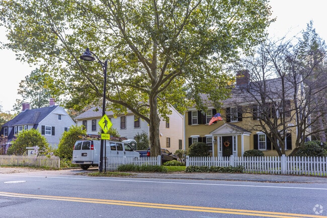 A well-maintained row of colonial homes in Concord.