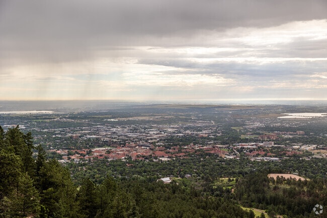 Enjoy a grand view of West Pearl and Boulder from the famous Flatirons.