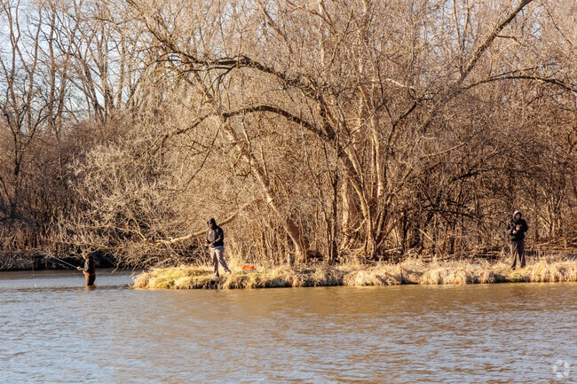 Hawthorne locals are fishing at the pond in Community Park.