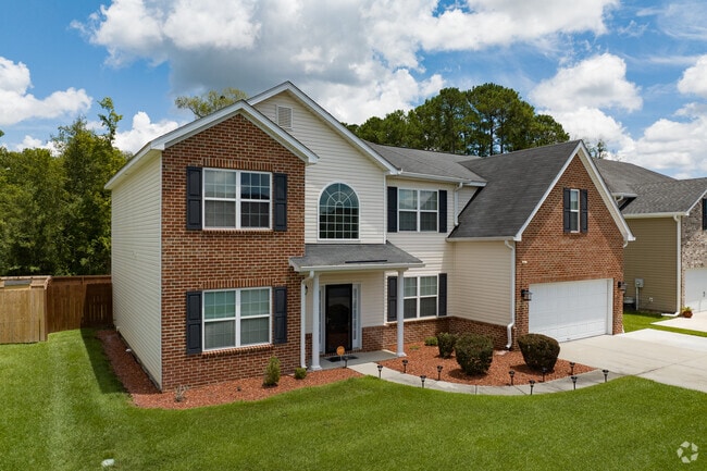 New construction homes in Southwest Chatham feature larger floor plans with arched windows.
