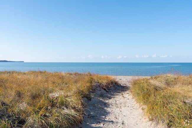 Sunset Bay Beach offers a full family-friendly beach experience combined with a vibrant tropical-style bar scene, all in a well-maintained, lifeguarded environment.