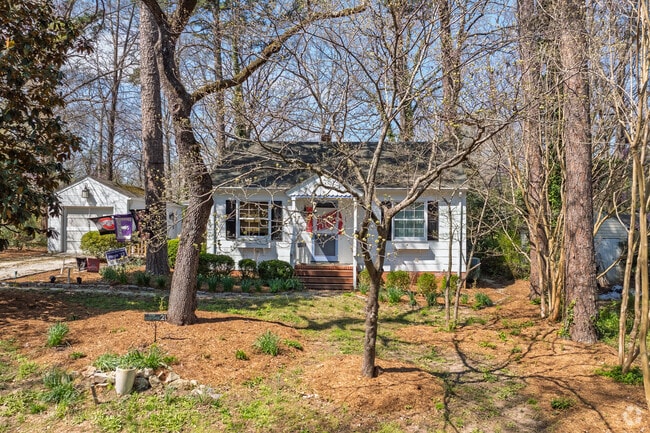 The majority of homes in Glen Lennox are situated on heavily wooded lots.