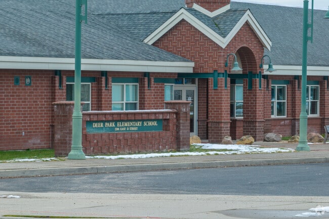 Deer Park Elementary features a small brick building.