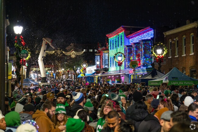 Thousands take to the streets to celebrate the Manayunk Christmas Tree Lighting.