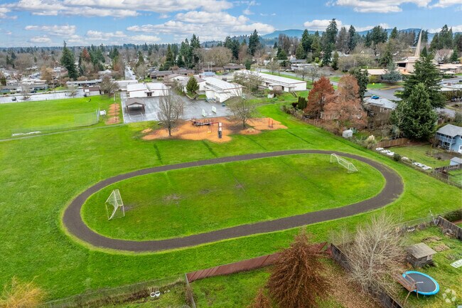 Adams Elementary School has a track for students to run around in the Friendly neighborhood.