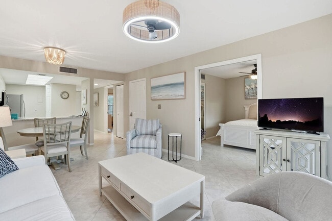 600 Neapolitan Way unit FL1-ID1073549P, Naples, FL 34103 - photo 2