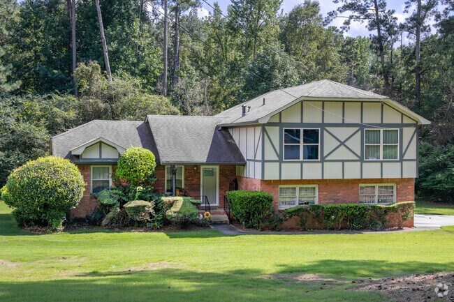 Some Stonecrest houses with distinctive Dutch roofing adds to the neighborhood historic charm.
