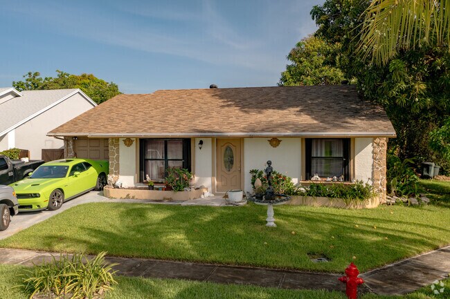 Tropical Paradise-Ranch Style Home in the Lantana neighborhood in South FL.