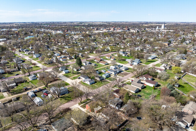 In the center of Spencer, older homes line gridded, tree-shaded streets.