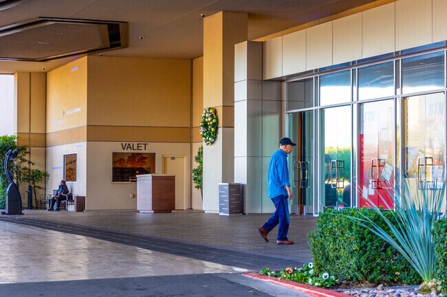 Locals enter Palace Station located on Sahara.