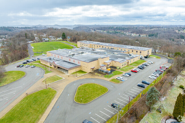 Wander through the peaceful campus with Plum Middle School.