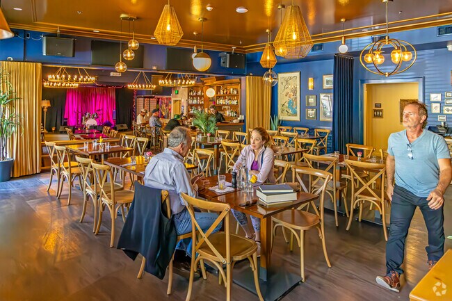 Pearl Moon hosts weekly live music nights, making it a neighborhood favorite.