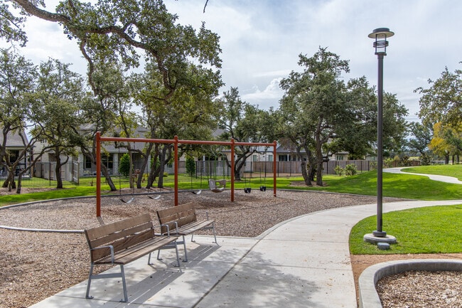 Amenities at Parmer Ranch feature a new park with trails, playgrounds, and covered picnic areas.