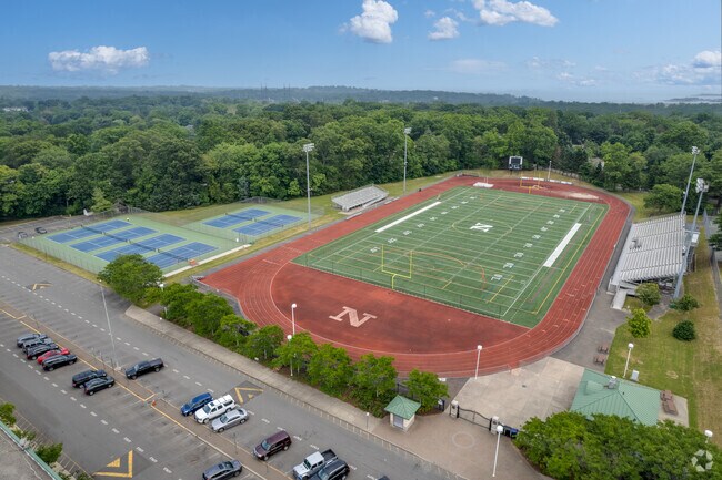 Students enjoy walking around the track and playing tennis at Norwalk High School.