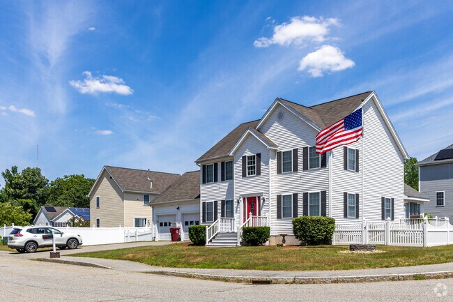 A group of contemporary New England styled homes in the Pawtucketville neighborhood.