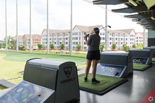 A short drive from Enderly Park, TopGolf provides games, food, and fun in west Charlotte.