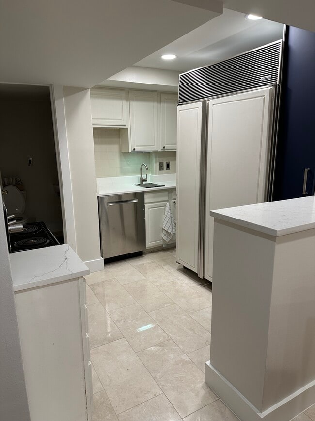 Kitchen and Entrance to Bathroom