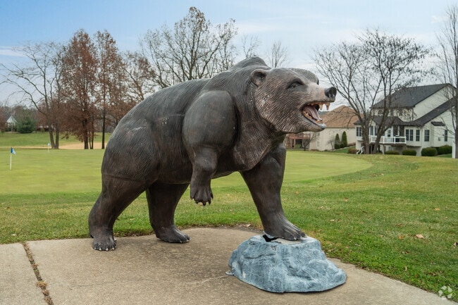 An iconic statue watches over the putting green at Wentzville's Bear Creek golf course.