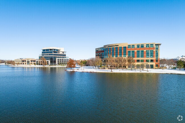 Commerce Bank sits beside a quiet lake right outside the Brookhollow neighborhood.