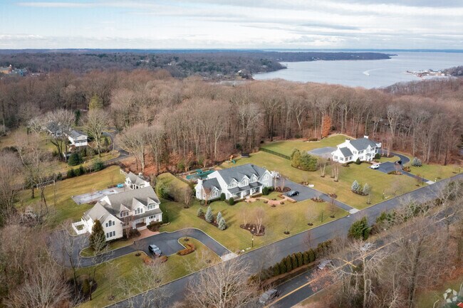 Colonials and harbor has gorgeous land nearby the water in Cold Spring Harbor.