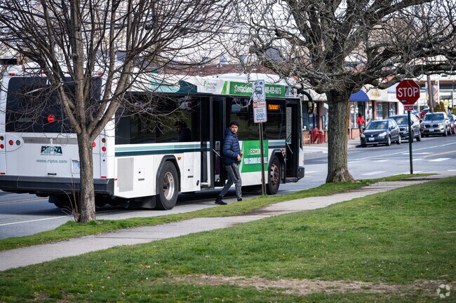 Navigating Oak Hill's vibrant scene with a ride on the RIPTA bus to Hope St., Providence.