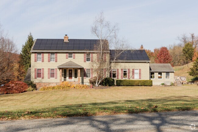 This colonial home in Lafayette has been modernized with solar panels.
