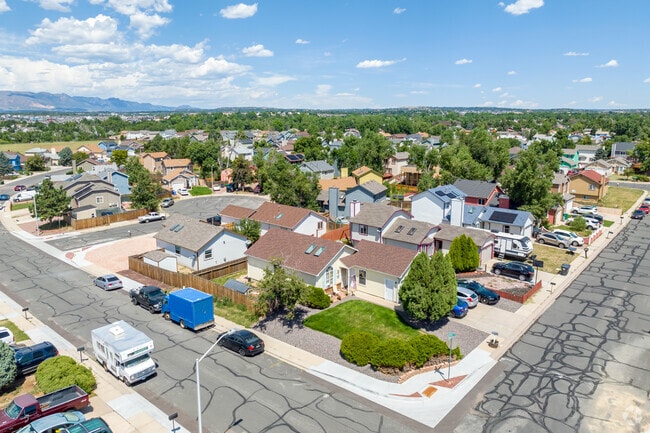 Homes in the Gateway Park neighborhood are intertwined with mature trees.