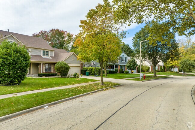 Mature trees shade the sidewalks of Woodlands at Fiore.