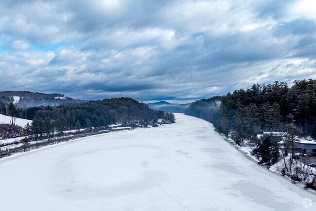 The City of Hanover, NH sits alongside the banks of the Connecticut River shown here on a snowy morning.