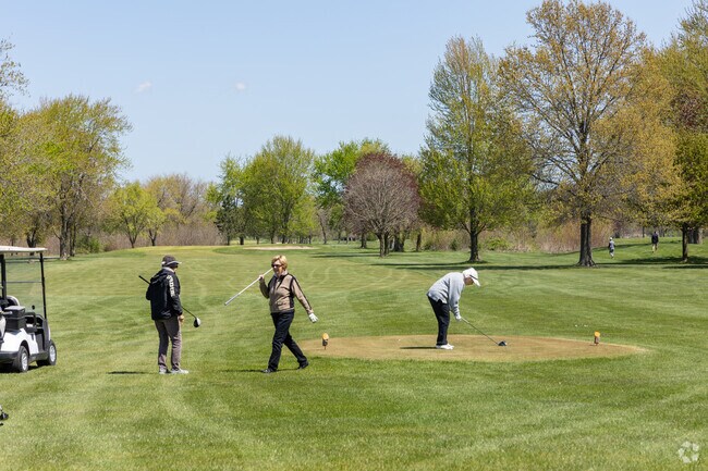 Tee off with friends at the River Pointe public country club in Ainsworth.