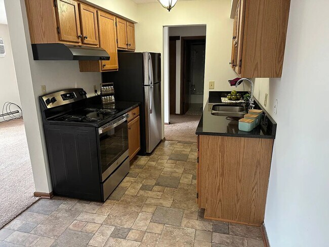 Black Granite Counters with Tile Floors