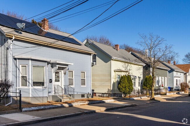 Streets in Downtown Pawtucket feature elegant single family Colonial style homes.