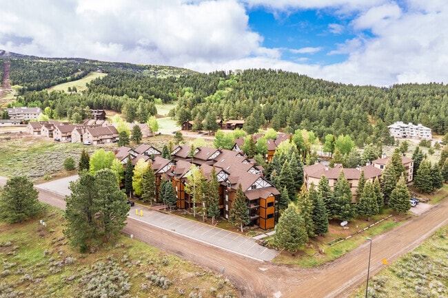 Higher elevation brings a mild climate and lush green trees to Angel Fire.
