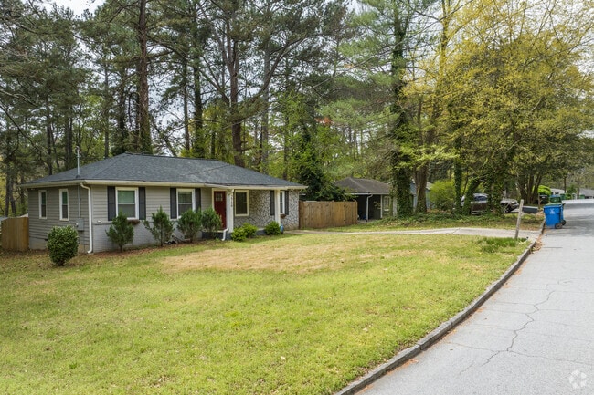 Lincoln's wide curvey streets are shaded with towering trees.
