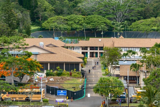 Students head to the exits as school lets out.