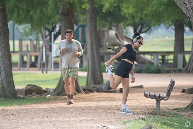 Walking trails wind through scenic park landscapes.