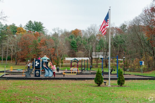 Families can take their children to enjoy the playground at Powder Mill Park.